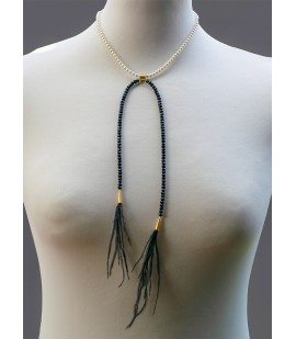 Elegant beaded necklace with ostrich feather.