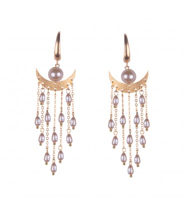 Dangling pearl earrings.