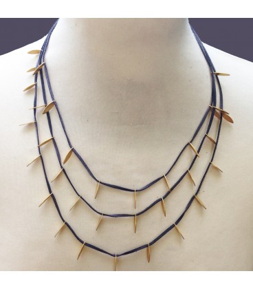 Layered faux suede necklace.