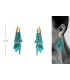 Long turquoise dangle earrings.